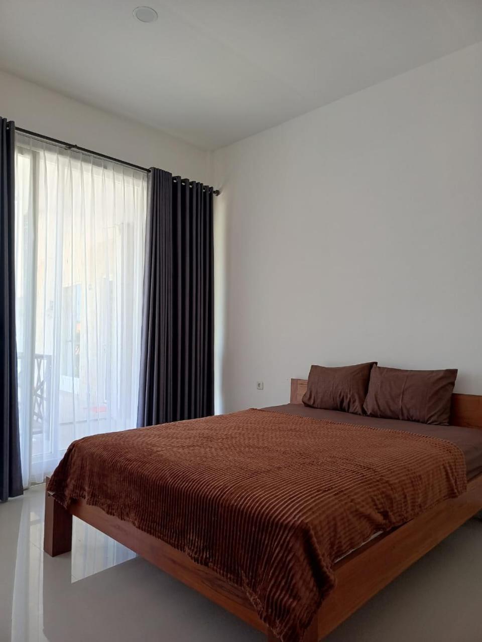 Zavana Rooms & Restaurant Tanjungkarang Exterior photo